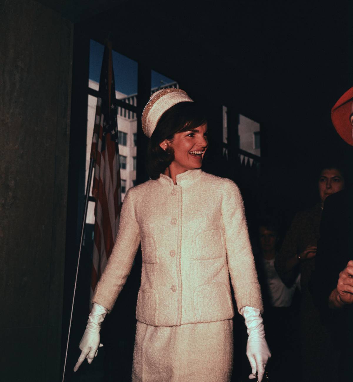 Jacqueline Kennedy Smiling While Attending Fashion Show