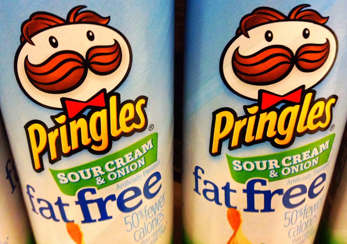 Two cans of fat free Pringles are seen.