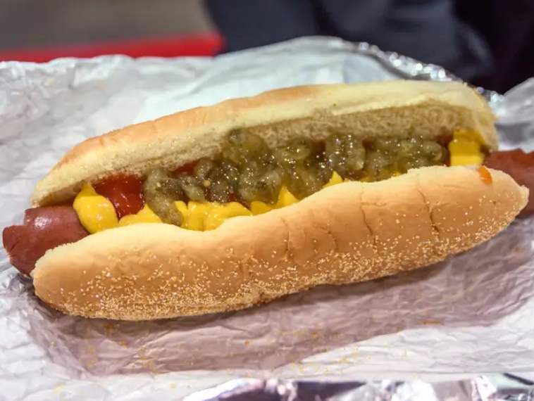 Buy Hot Dogs And Soda At The Food Court